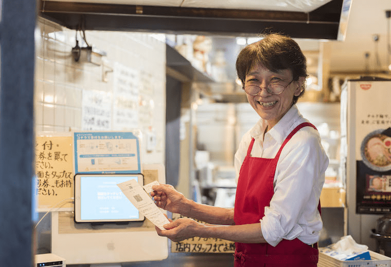 写真:Airウェイトで受付をしている様子